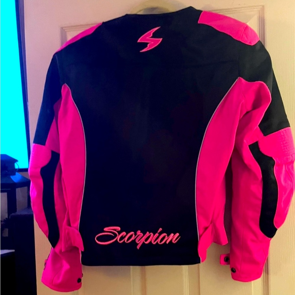 Women’s size, large scorpion, bike jacket, professional brand new never worn